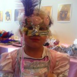 Love the rosettes on this mask!